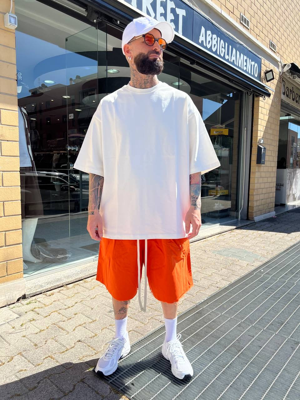 Pantaloncino arancione taglio vivo cotone