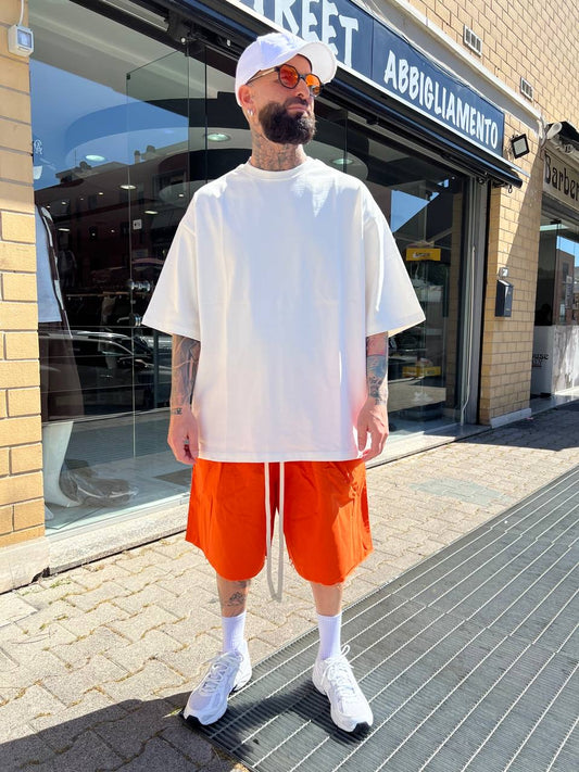Pantaloncino arancione taglio vivo cotone
