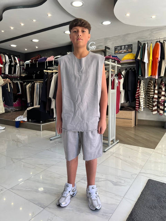 Completino smanicato grigio