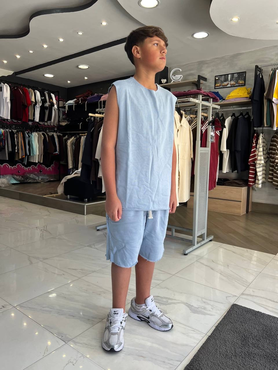 Completino smanicato celeste KIDS