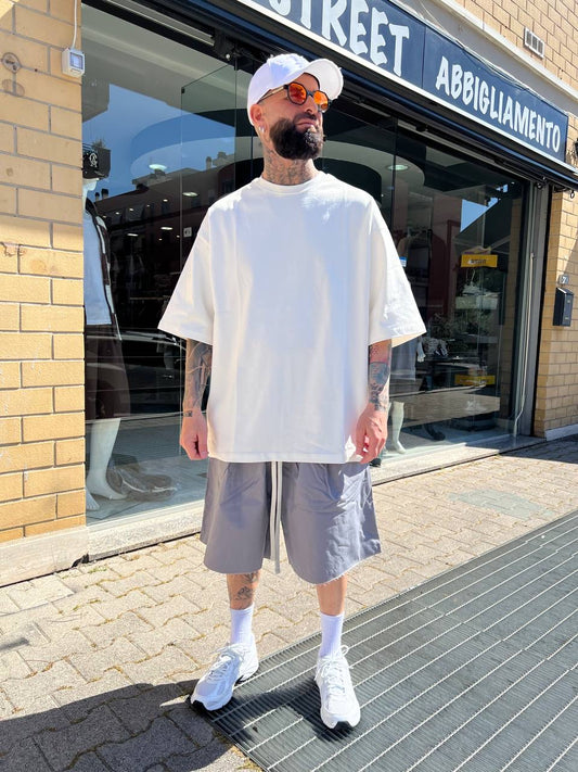 Pantaloncino grigio chiaro taglio vivo cotone